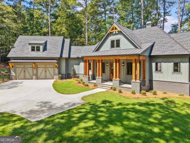 Stunning Lakefront Luxury Home in Reynolds Landing with Sunset on Reynolds Lake Oconee - The Landing in Georgia - for sale on GolfHomes.com, golf home, golf lot