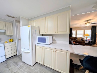 PICTURES SAY IT ALL! Uniquely designed 2 bedroom 2 bath on Grasslands Golf and Country Club in Florida - for sale on GolfHomes.com, golf home, golf lot