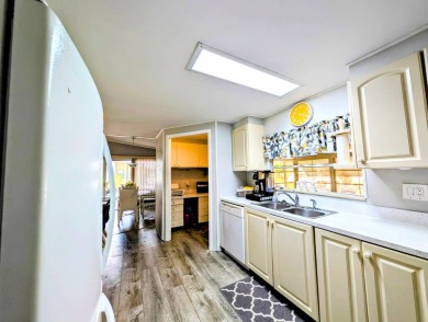 PICTURES SAY IT ALL! Uniquely designed 2 bedroom 2 bath on Grasslands Golf and Country Club in Florida - for sale on GolfHomes.com, golf home, golf lot