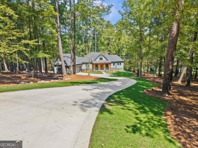 Stunning Lakefront Luxury Home in Reynolds Landing with Sunset on Reynolds Lake Oconee - The Landing in Georgia - for sale on GolfHomes.com, golf home, golf lot