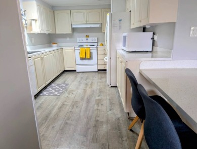 PICTURES SAY IT ALL! Uniquely designed 2 bedroom 2 bath on Grasslands Golf and Country Club in Florida - for sale on GolfHomes.com, golf home, golf lot