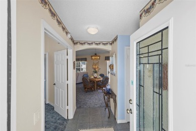 Welcome Home to  The Villages lifestyle in this stunning GOLF on El Diablo Executive Golf Course in Florida - for sale on GolfHomes.com, golf home, golf lot
