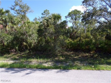 This lot is on a quiet street that would be a great place to on Sabal Trace Golf and Country Club in Florida - for sale on GolfHomes.com, golf home, golf lot