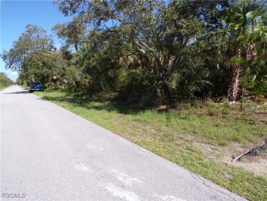 This lot is on a quiet street that would be a great place to on Sabal Trace Golf and Country Club in Florida - for sale on GolfHomes.com, golf home, golf lot