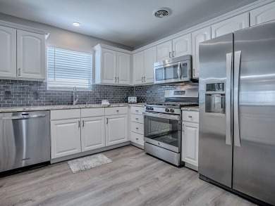 Bond Paid and exceptional Living awaits in this stylish on Mallory Hill Golf and Country Club in Florida - for sale on GolfHomes.com, golf home, golf lot