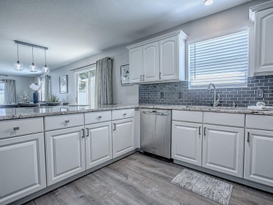 Bond Paid and exceptional Living awaits in this stylish on Mallory Hill Golf and Country Club in Florida - for sale on GolfHomes.com, golf home, golf lot