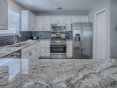Bond Paid and exceptional Living awaits in this stylish on Mallory Hill Golf and Country Club in Florida - for sale on GolfHomes.com, golf home, golf lot