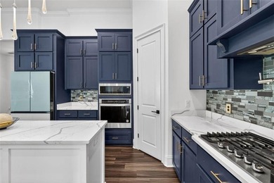 Experience luxury living in this meticulously maintained and on Oak Grove Island Golf and Country Club in Georgia - for sale on GolfHomes.com, golf home, golf lot