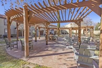 Nestled in a gated condominium community near a golf course and on Sonoma Ranch Golf Course in New Mexico - for sale on GolfHomes.com, golf home, golf lot