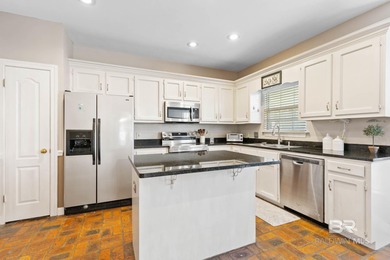 Welcome Home! 4 bedroom, 2 bath, BRICK, SINGLE STORY home on Lake Forest Yacht and Country Club in Alabama - for sale on GolfHomes.com, golf home, golf lot