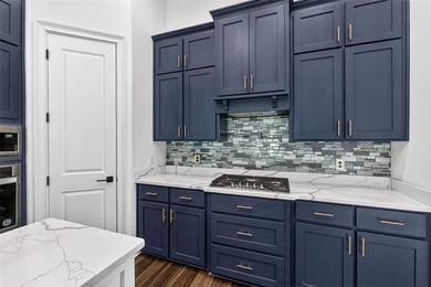 Experience luxury living in this meticulously maintained and on Oak Grove Island Golf and Country Club in Georgia - for sale on GolfHomes.com, golf home, golf lot