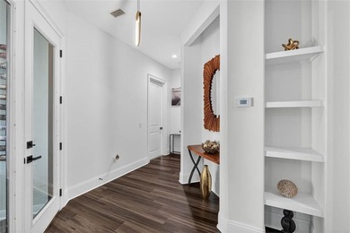 Experience luxury living in this meticulously maintained and on Oak Grove Island Golf and Country Club in Georgia - for sale on GolfHomes.com, golf home, golf lot