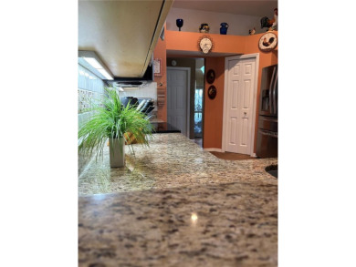 Welcome to this beautiful home, impeccably cared for, and on Meadow Oaks Golf and Country Club in Florida - for sale on GolfHomes.com, golf home, golf lot