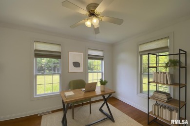 Located on a spacious corner lot just steps from the driving on WeaverRidge Golf Club in Illinois - for sale on GolfHomes.com, golf home, golf lot