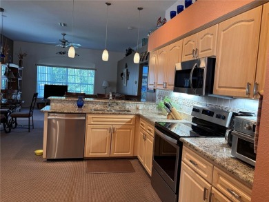 Welcome to this beautiful home, impeccably cared for, and on Meadow Oaks Golf and Country Club in Florida - for sale on GolfHomes.com, golf home, golf lot