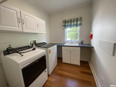 Located on a spacious corner lot just steps from the driving on WeaverRidge Golf Club in Illinois - for sale on GolfHomes.com, golf home, golf lot