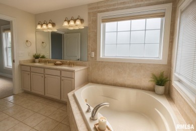 Located on a spacious corner lot just steps from the driving on WeaverRidge Golf Club in Illinois - for sale on GolfHomes.com, golf home, golf lot