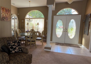 Welcome to this beautiful home, impeccably cared for, and on Meadow Oaks Golf and Country Club in Florida - for sale on GolfHomes.com, golf home, golf lot