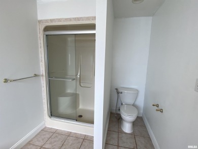 Located on a spacious corner lot just steps from the driving on WeaverRidge Golf Club in Illinois - for sale on GolfHomes.com, golf home, golf lot