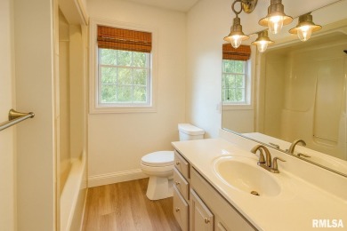 Located on a spacious corner lot just steps from the driving on WeaverRidge Golf Club in Illinois - for sale on GolfHomes.com, golf home, golf lot