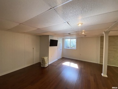 Located on a spacious corner lot just steps from the driving on WeaverRidge Golf Club in Illinois - for sale on GolfHomes.com, golf home, golf lot