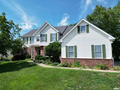 Located on a spacious corner lot just steps from the driving on WeaverRidge Golf Club in Illinois - for sale on GolfHomes.com, golf home, golf lot