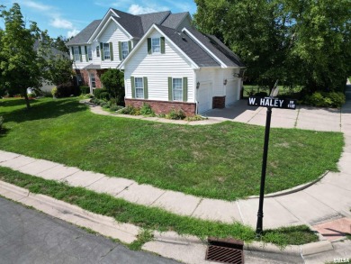 Located on a spacious corner lot just steps from the driving on WeaverRidge Golf Club in Illinois - for sale on GolfHomes.com, golf home, golf lot