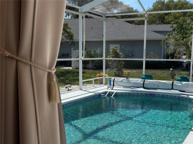 Welcome to this beautiful home, impeccably cared for, and on Meadow Oaks Golf and Country Club in Florida - for sale on GolfHomes.com, golf home, golf lot