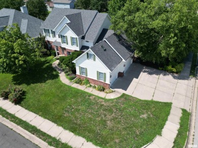 Located on a spacious corner lot just steps from the driving on WeaverRidge Golf Club in Illinois - for sale on GolfHomes.com, golf home, golf lot