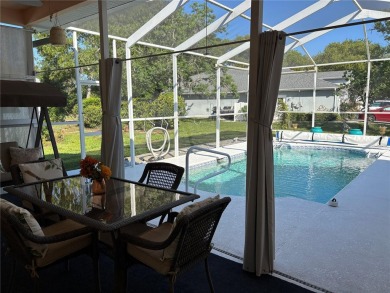 Welcome to this beautiful home, impeccably cared for, and on Meadow Oaks Golf and Country Club in Florida - for sale on GolfHomes.com, golf home, golf lot