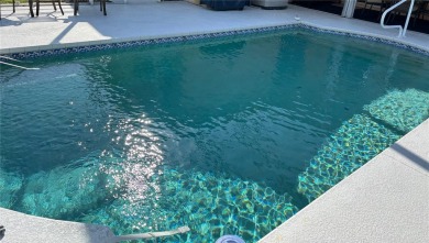 Welcome to this beautiful home, impeccably cared for, and on Meadow Oaks Golf and Country Club in Florida - for sale on GolfHomes.com, golf home, golf lot