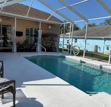 Welcome to this beautiful home, impeccably cared for, and on Meadow Oaks Golf and Country Club in Florida - for sale on GolfHomes.com, golf home, golf lot