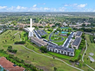 This updated condo features a spacious living area with an on Boca Dunes Golf and Country Club in Florida - for sale on GolfHomes.com, golf home, golf lot