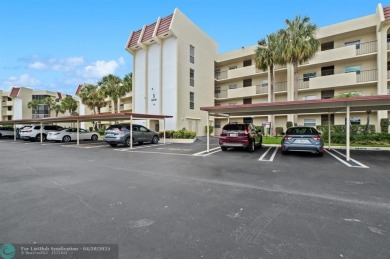 This updated condo features a spacious living area with an on Boca Dunes Golf and Country Club in Florida - for sale on GolfHomes.com, golf home, golf lot