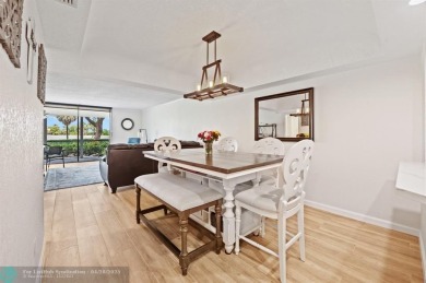 This updated condo features a spacious living area with an on Boca Dunes Golf and Country Club in Florida - for sale on GolfHomes.com, golf home, golf lot