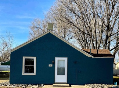 A charming, small home ownership opportunity awaits you!  It's on Elmwood Park Golf Course in South Dakota - for sale on GolfHomes.com, golf home, golf lot