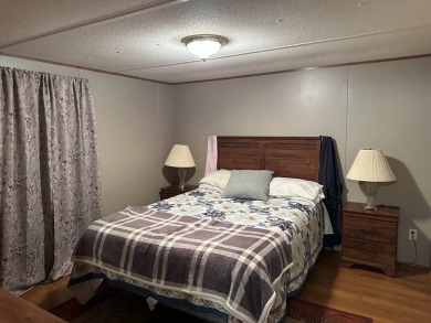 Kentucky Lake area 2bedroom/1bath fully furnished mobile home on Tennessean Golf Club in Tennessee - for sale on GolfHomes.com, golf home, golf lot