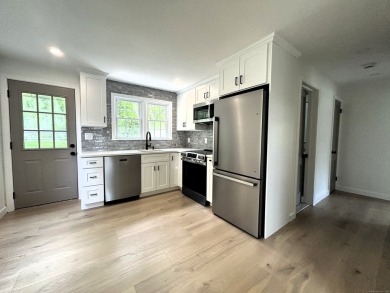 Welcome home to this beautifully renovated Cape in the desirable on Tashua Knolls Golf Course in Connecticut - for sale on GolfHomes.com, golf home, golf lot
