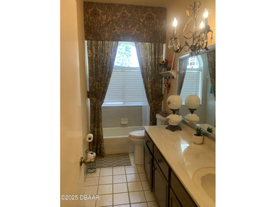 WOW! Rare offering. This 3/2.5 Pool home sits on a half acre on on The Club At Pelican Bay - North Course in Florida - for sale on GolfHomes.com, golf home, golf lot