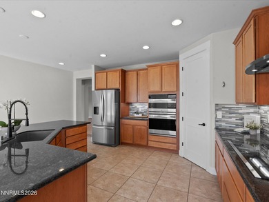 Behold this beautifully refreshed 2015 Craftsman on .49 acres in on Hidden Valley Country Club in Nevada - for sale on GolfHomes.com, golf home, golf lot