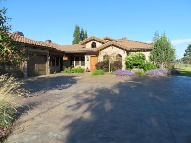 Welcome home to this luxurious Tuscan style townhome, bordering on Eagle Bend Golf Course in Montana - for sale on GolfHomes.com, golf home, golf lot