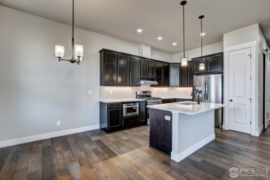 Enjoy ranch style living w/ a finished basement in this gorgeous on Highland Meadows Golf Course in Colorado - for sale on GolfHomes.com, golf home, golf lot