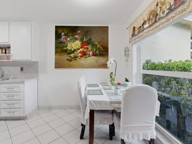 Beautifully updated villa in Palm Greens 55+ community. Home on Villa Del Ray Golf Club in Florida - for sale on GolfHomes.com, golf home, golf lot