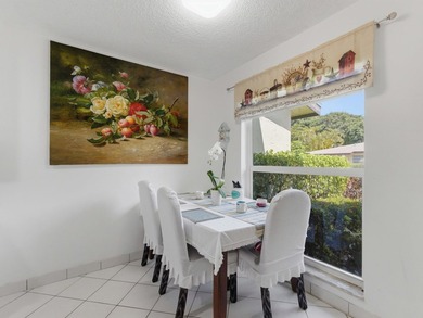 Beautifully updated villa in Palm Greens 55+ community. Home on Villa Del Ray Golf Club in Florida - for sale on GolfHomes.com, golf home, golf lot