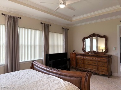 YOU'LL LOVE YOUR LIFE WITH PEACEFUL LAKE VIEWS of BEAUTIFUL on Gateway Golf and Country Club in Florida - for sale on GolfHomes.com, golf home, golf lot