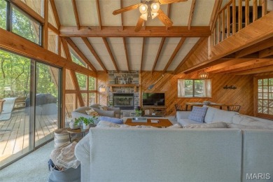 Escape to your own lakeside paradise at this super cute chalet on Innsbrook Resort Golf Course in Missouri - for sale on GolfHomes.com, golf home, golf lot