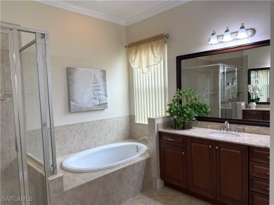 YOU'LL LOVE YOUR LIFE WITH PEACEFUL LAKE VIEWS of BEAUTIFUL on Gateway Golf and Country Club in Florida - for sale on GolfHomes.com, golf home, golf lot