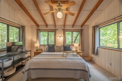 Escape to your own lakeside paradise at this super cute chalet on Innsbrook Resort Golf Course in Missouri - for sale on GolfHomes.com, golf home, golf lot