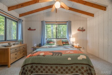 Escape to your own lakeside paradise at this super cute chalet on Innsbrook Resort Golf Course in Missouri - for sale on GolfHomes.com, golf home, golf lot