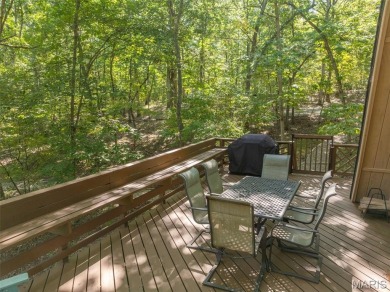Escape to your own lakeside paradise at this super cute chalet on Innsbrook Resort Golf Course in Missouri - for sale on GolfHomes.com, golf home, golf lot